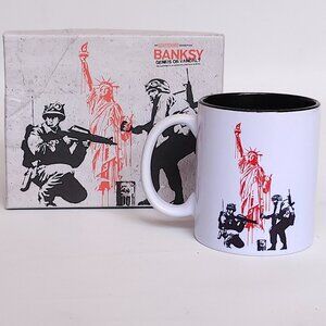 BANKSY GENIUS or VANDAL? Unothorized Echibition Mug BNIP